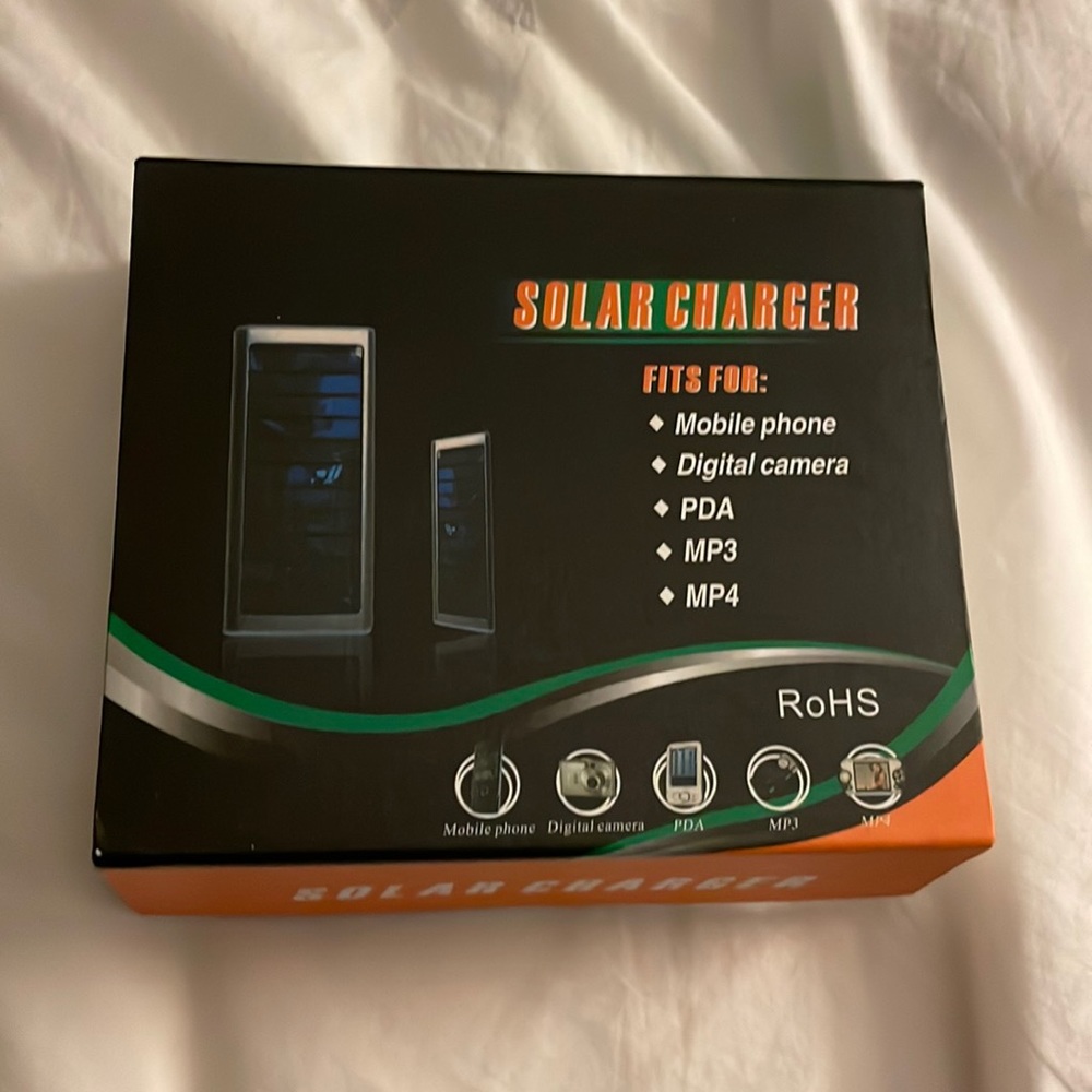 NWOT: RoHS solar phone charger